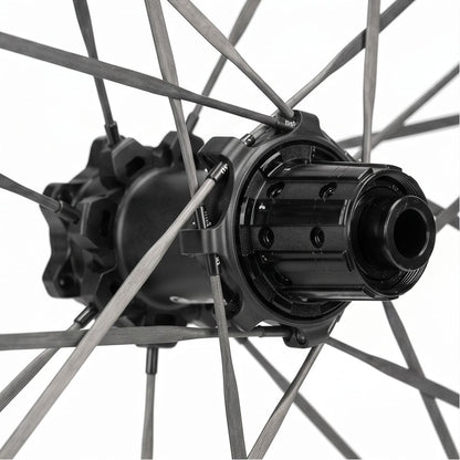 Close-up of a bicycle hub and gear system on a white background